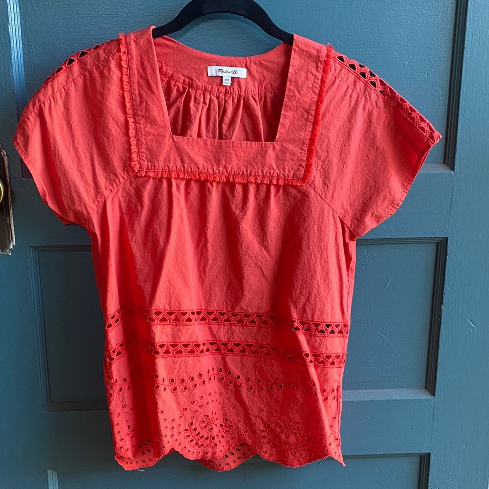 Madewell brand blouse with eyelet details.